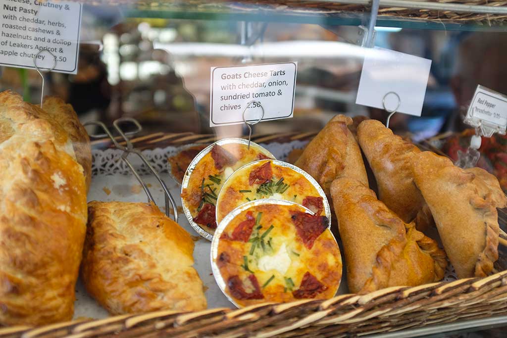 Looking in a bakers window in East Street