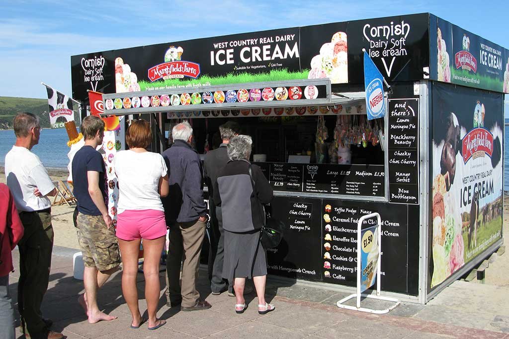 Ice cream kiosk on the promenade with queues of people