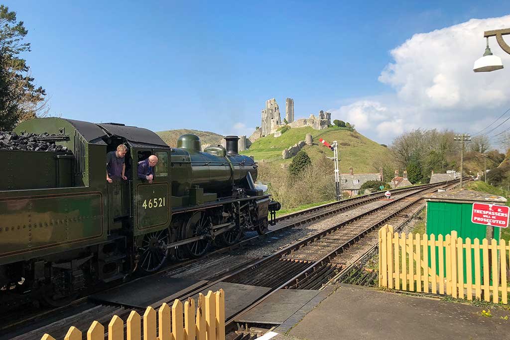 Train leaving Corfe Castle station for the 5 minute journey to Norden