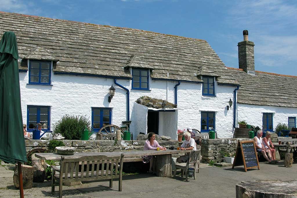 Outdoor seating at the Square and Compass pub